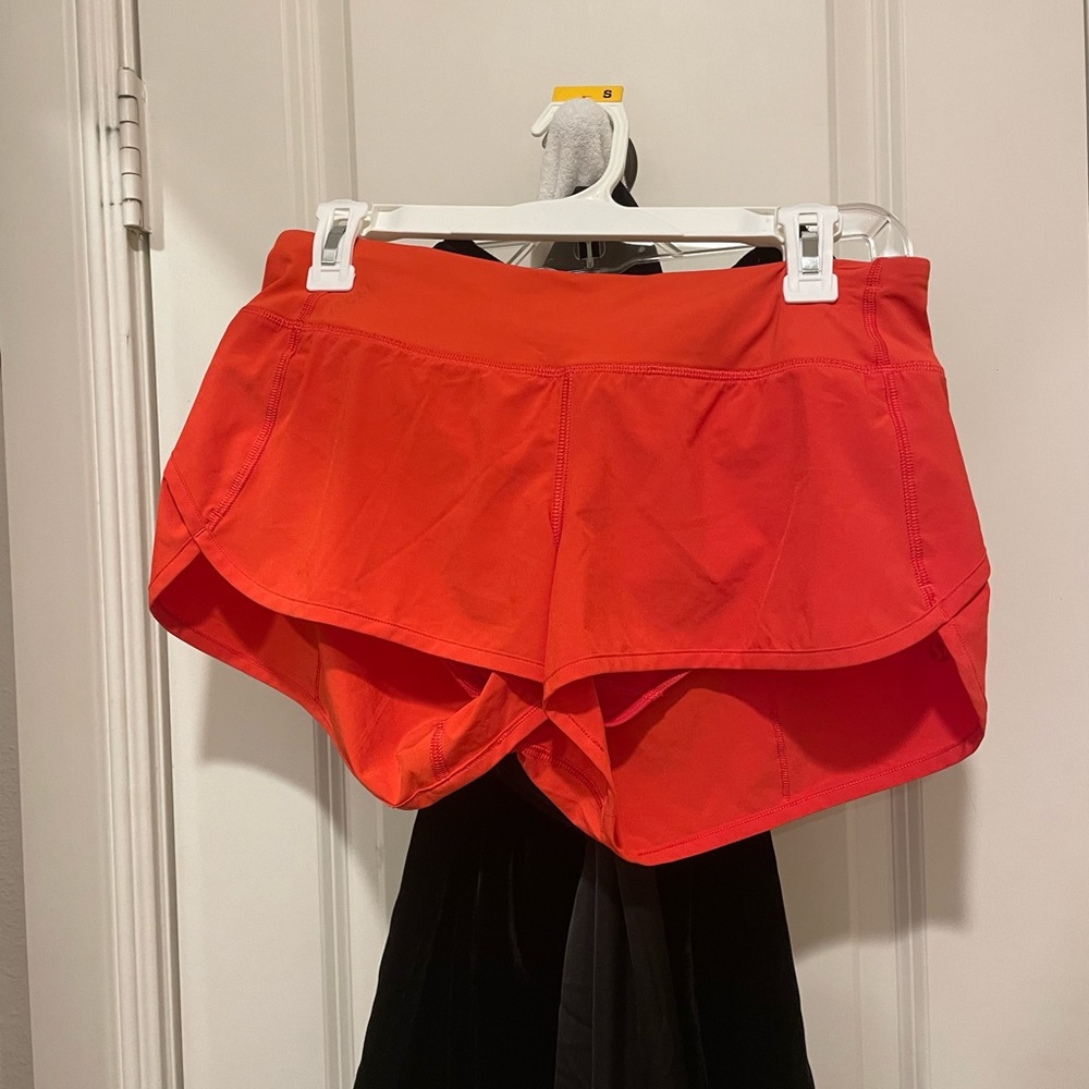 Lulu lemon athletic speed up shorts. Size 6. Orange. 2 in inseam
